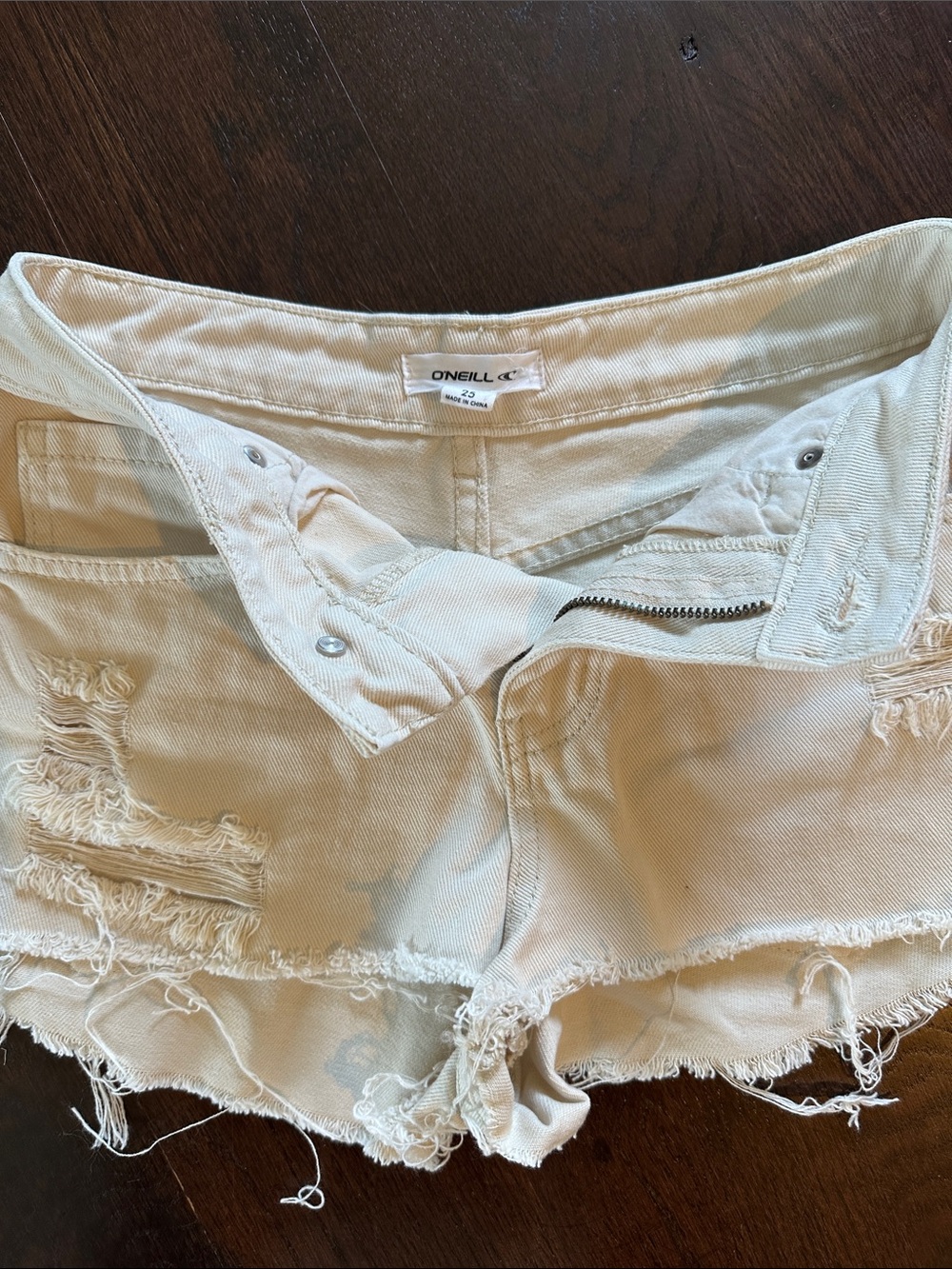 O'Neill Women's Cream Distressed Denim Cutoff Shorts